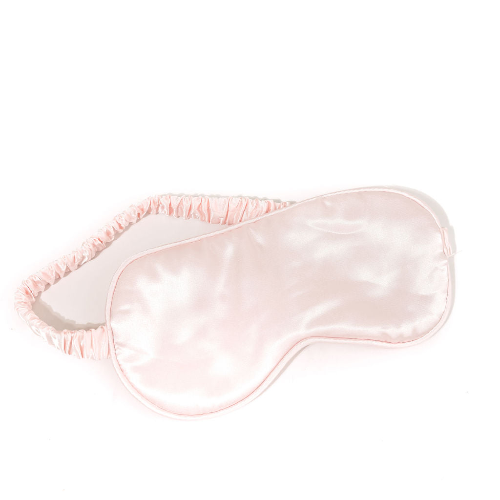pink eye mask/sleep mask on a white background