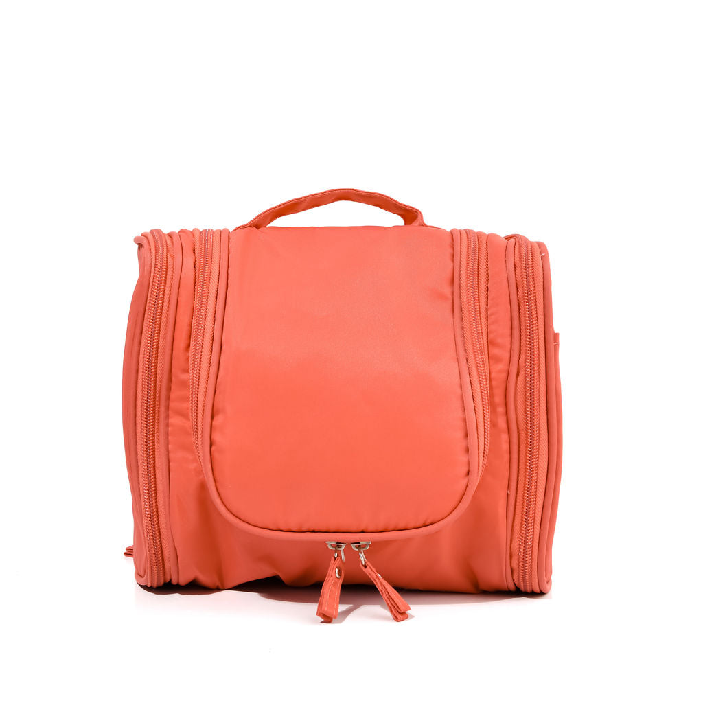 pink hanging cosmetic case on a white background