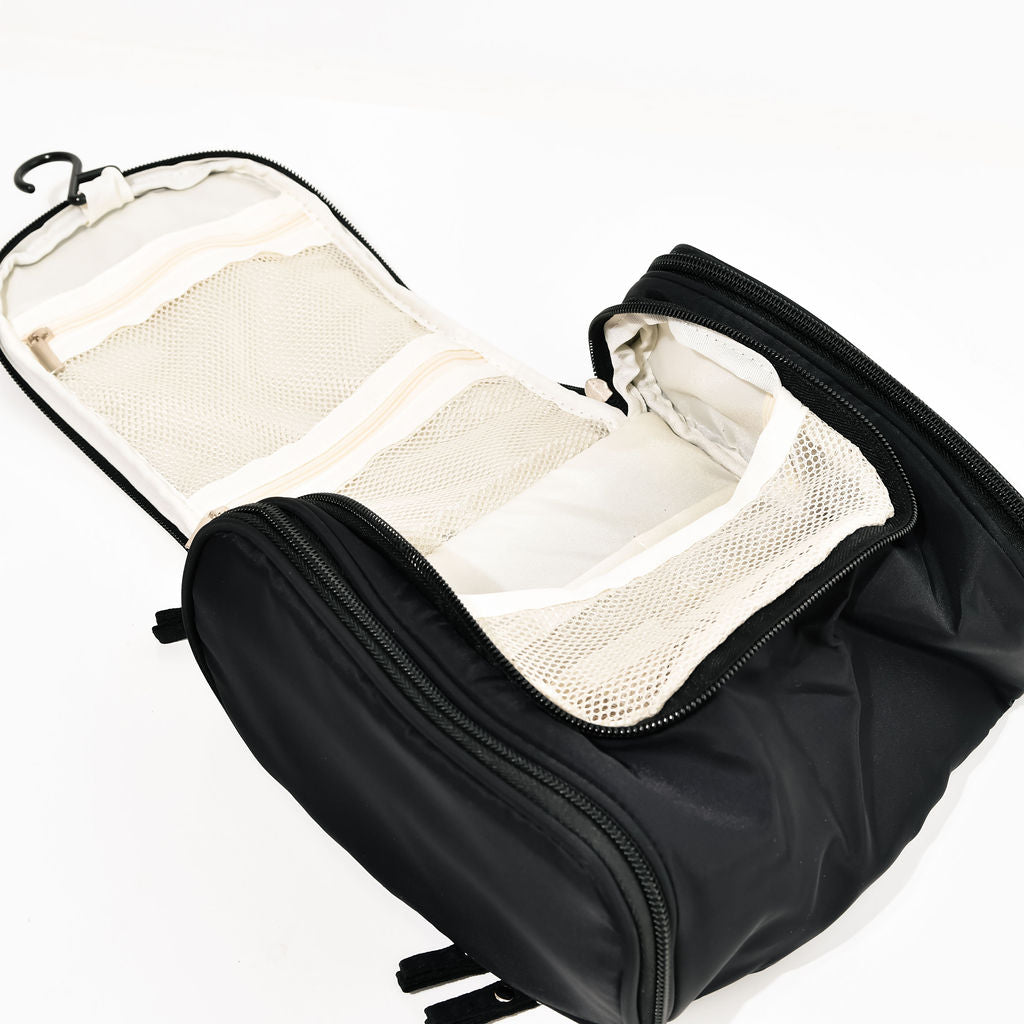 black hanging cosmetic case on a white background