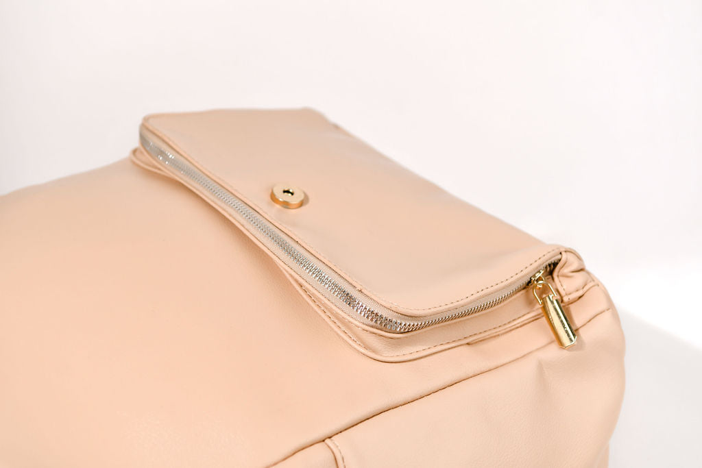 beige backpack front pocket on a white background
