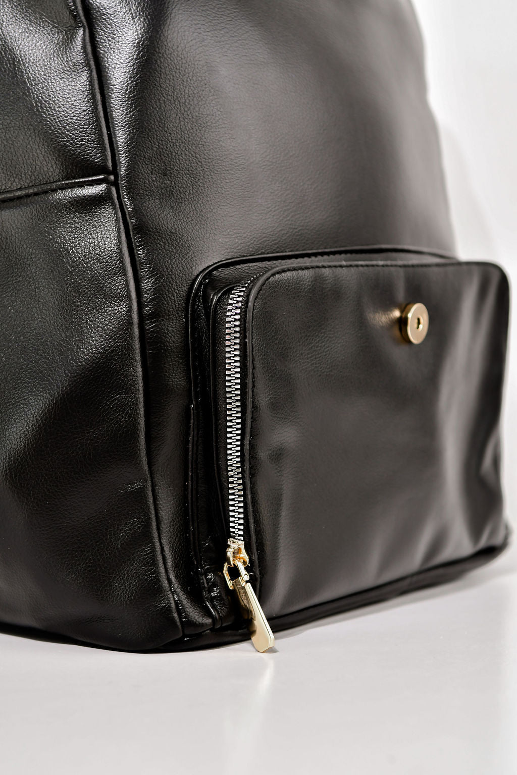 black backpack front pocket on a white background