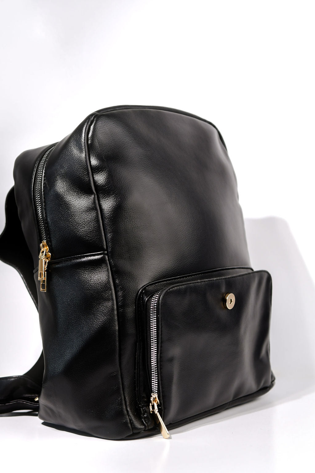 black backpack on a white background