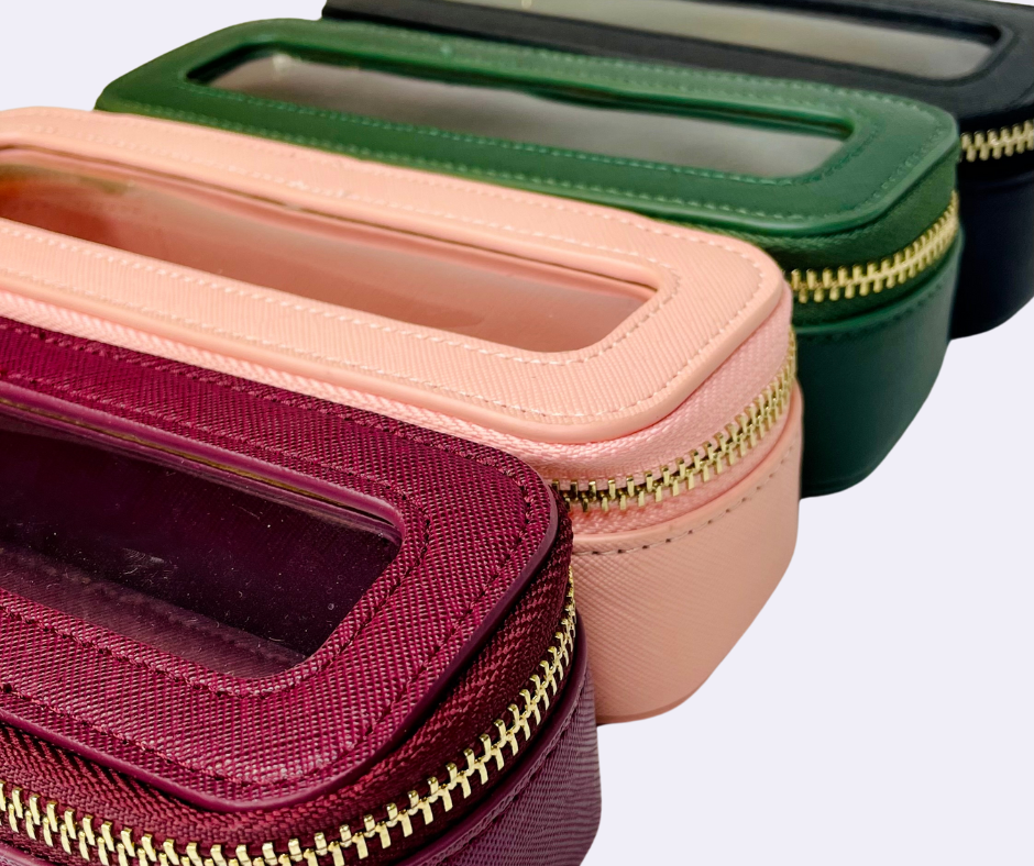 close ups are always needed! this shot shows the colours of the mini cosmetic cases - purple, pink, green and black at the back
