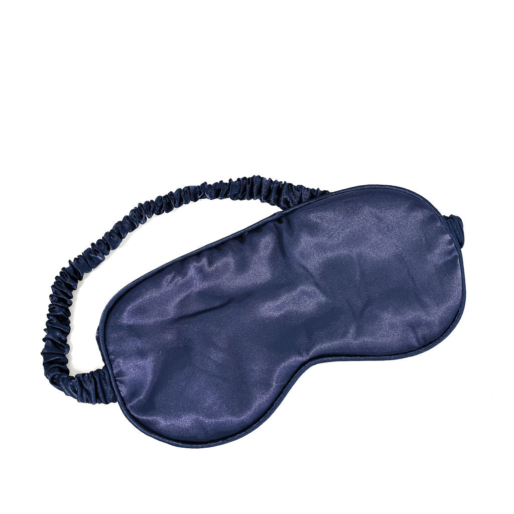 navy eye mask/sleep mask on a white background