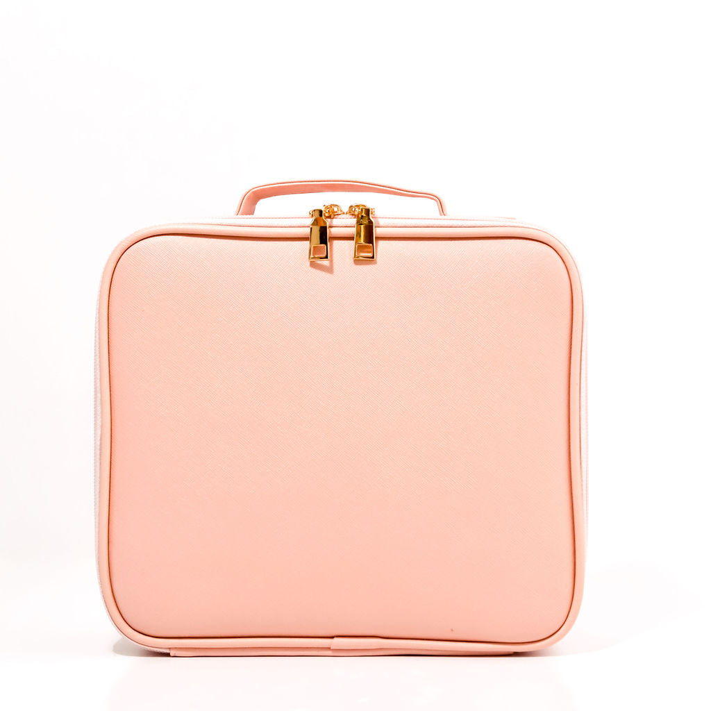 pink cosmetic case on a white background